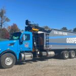 Godspeed Tree Service grapple truck with chipper, ready for storm cleanup and emergency response in Winston-Salem.
